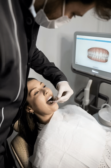 a woman getting a dental treatment