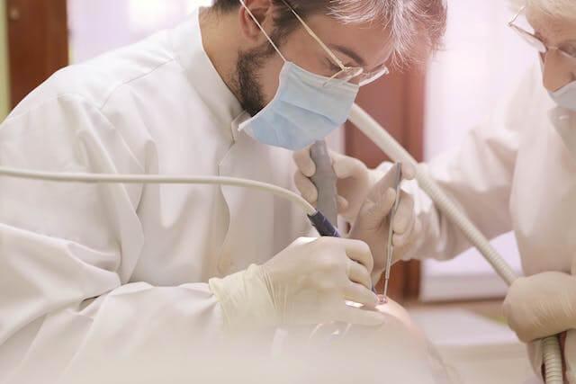 dental professionals working on a dental procedure