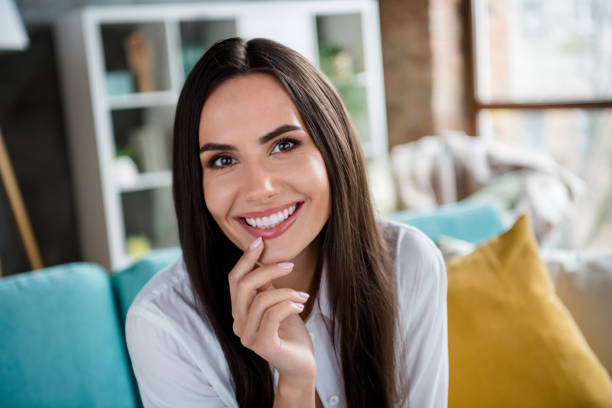 image of a woman smiling with beautiful set of teeth